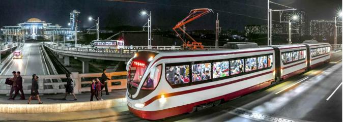 Tram of a new type running along the street of Pyongyang