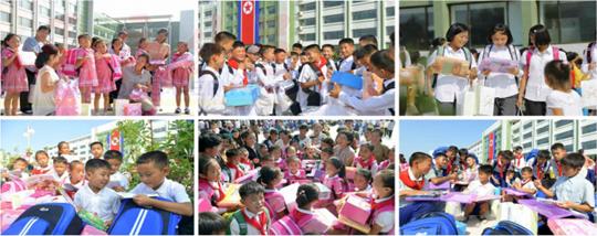 Schoolchildren in the flood-hit areas who received new uniforms, schoolbags and school things