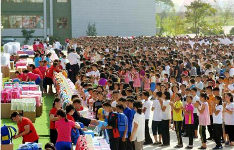 Children and students from the flood-stricken area who received gifts of love