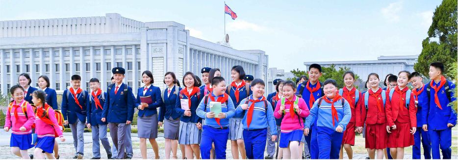 Schoolchildren and students are happy in new uniforms while shouldering satchels filled with school things