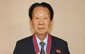 The respected  Comrade Kim Jong Un sent grateful birthday table to Kim Su Gon, a lecturer in the faculty of physics, a merited scientist, a candidate academician, a professor, a doctor