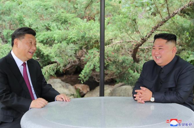 Supreme Leader Kim Jong Un Hosts Luncheon for President Xi Jinping and His Wife Peng Liyuan